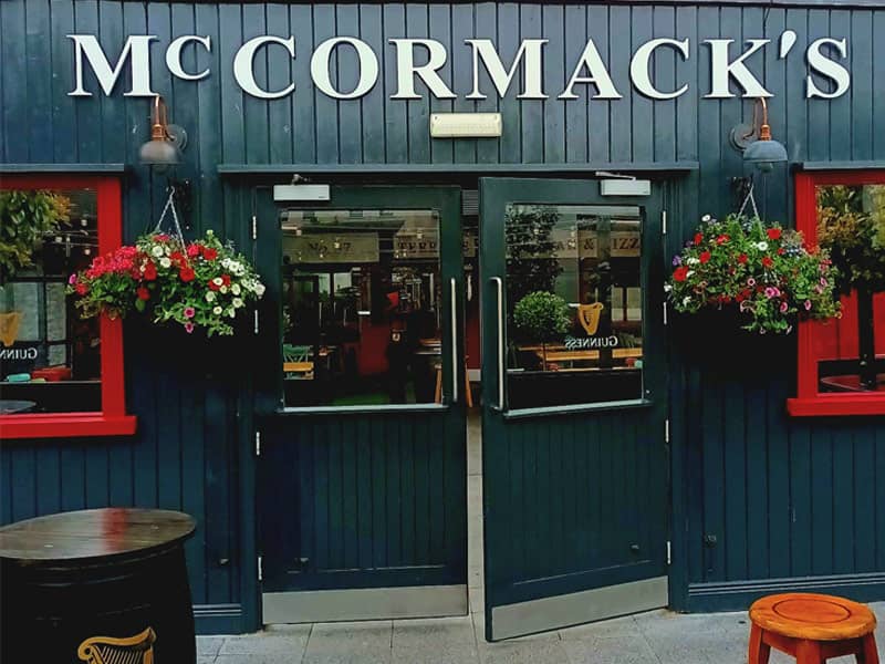 Liffey Vale Nurseries Floral Displays - Pub entrance filled with flowers in hanging baskets