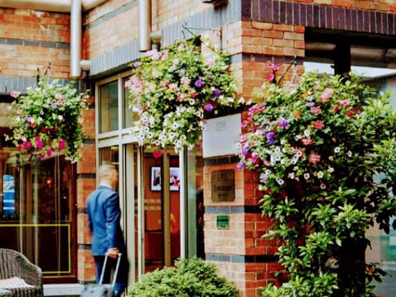 Liffey Vale Nurseries Floral Displays - hotel entrance filled with flowers in hanging baskets